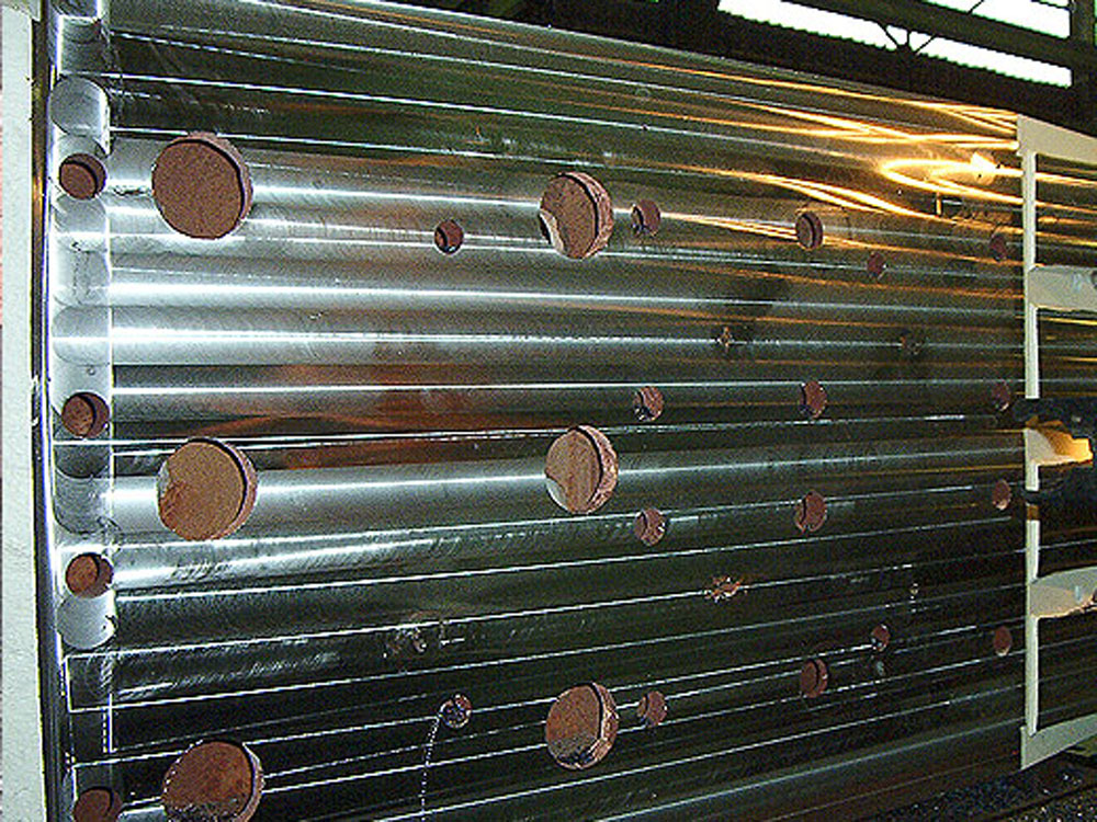 Walzen für Maschinenreparatur und Instandsetzung | BSS GmbH Mehrere Metallwalzen für den Einsatz in Industrieanlagen